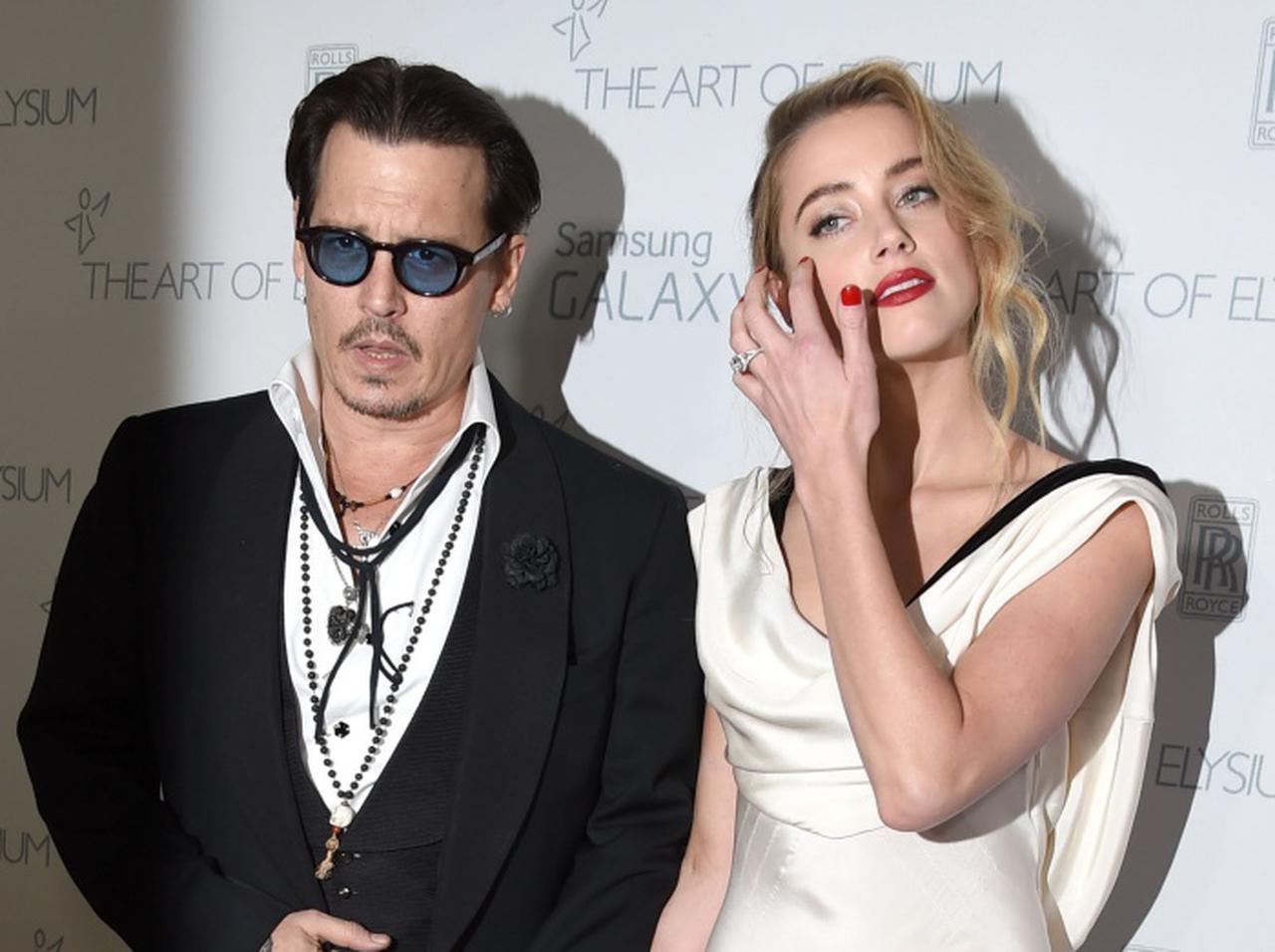 アンバー・ハードがジョニー・デップを「グーで殴る」のを見た、ボディガードが証言