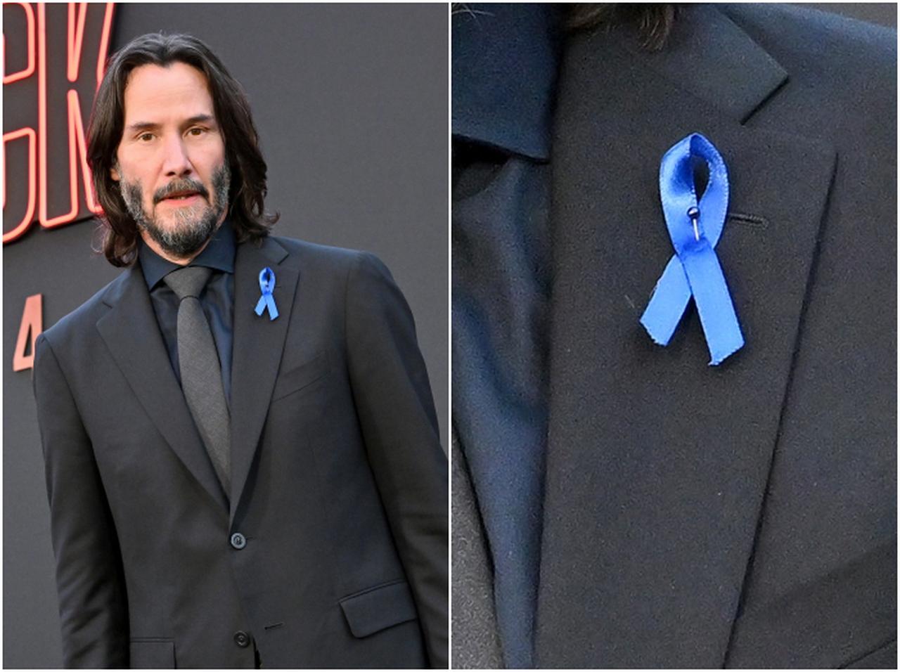 『ジョン・ウィック』のプレミアでキャストが「青のリボン」をつけていた理由に涙