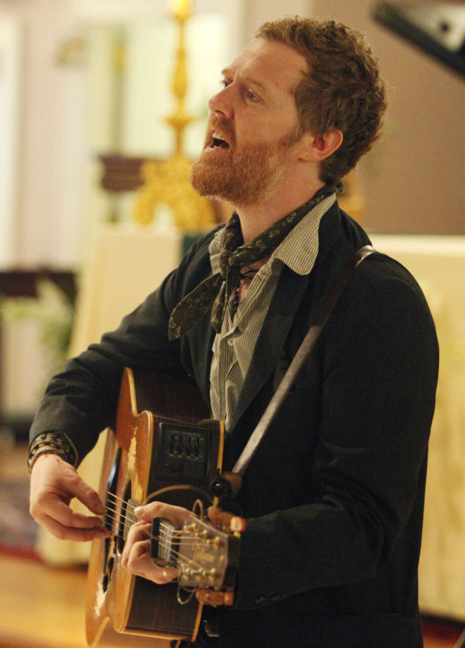 Glen Hansard sings during the funeral for Eunice Kennedy Shriver at Saint Francis Xavier Roman Catholic Church in the Hyannis section of Barnstable, Mass., Friday, Aug. 14, 2009. Shriver, the sister of President John F. Kennedy and Massachusetts Sen. Edward M. Kennedy, died Tuesday morning at Cape Cod Hospital at age 88. (AP Photo/Stephan Savoia, Pool)