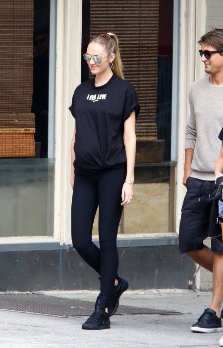 Pregnant model Candice Swanepoel  and her fiancé Hermann Nicoli walk in downtown Manhattan in New York City.