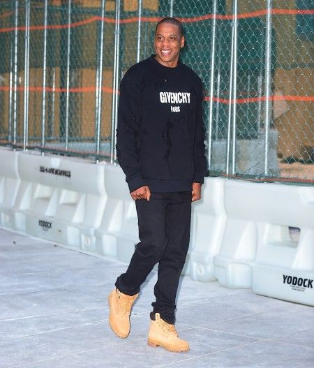 Jay Z has a big smile on as he steps out in NYC wearing Givenchy
